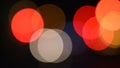 Bright red and orange colors bokeh lights in night darkness Royalty Free Stock Photo