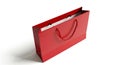 Bright Red Rectangular Shopping Bag with Braided Handles on White Background gift bag retail Royalty Free Stock Photo