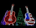 Bright Red, Red White and Blue and Purple Guitars and Holiday Tr Royalty Free Stock Photo