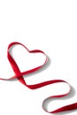 Heart shaped red ribbon for Valentine`s day celebration on an isolated white background Royalty Free Stock Photo