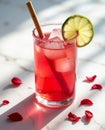 Bright Red Rimmed Cocktail with Lime Slice and Bamboo Straw, Sharp Sunlight and Marble Background Royalty Free Stock Photo