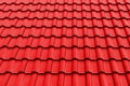 Bright red roof tiles pattern and seamless background