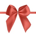 Bright red silk ribbon or tape decorated with bow. Fancy decorative design element. Beautiful festive glossy satin