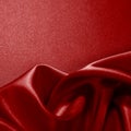 Bright red silk satin velvet. Beautiful soft wavy folds. Close-up. Shiny fabric background Royalty Free Stock Photo