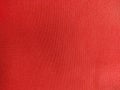 Bright red spunbond fabric is popular for making cloth bags Royalty Free Stock Photo