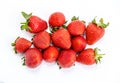 Bright red strawberry with green petals isolated on white background Royalty Free Stock Photo