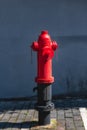 Bright red street fire hydrant