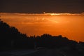 Bright red sunset over the track. Road to the city Royalty Free Stock Photo