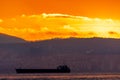 Bright red sunset sky over city and mountains Royalty Free Stock Photo