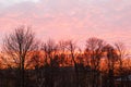 Bright red sunset in winter over old houses Royalty Free Stock Photo