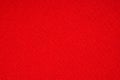 Bright red texture of dense fabric.Red fabric background. Royalty Free Stock Photo