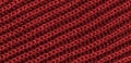 Bright red texture knitted wool scarf. Red textile background knitwear. Royalty Free Stock Photo