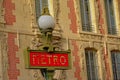Red Retro style metro sign in Paris, France Royalty Free Stock Photo