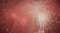 Bright red and white fireworks exploding in the night sky with sparkling light trails Royalty Free Stock Photo