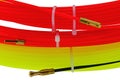 Bright red and yellow nylon control rods and spring spirals coiled and sealed with plastic tapes, white background