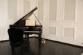 Bright room with a piano and a chair Royalty Free Stock Photo