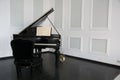 Bright room with a piano and a chair Royalty Free Stock Photo