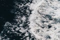 Bright sea water wave from a cruise ship. Ferry boat leaves a wave on a side in a dark blue water of Mediterranean Sea. Royalty Free Stock Photo