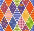 Bright seamless patchwork pattern from colorful rhombuses with geometric and floral ornaments. Quilt design Royalty Free Stock Photo