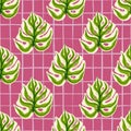 Bright seamless pattern with botanic green monstera elements print. Pink chequered background Royalty Free Stock Photo