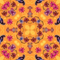 Bright seamless pattern with colorful flowers and paisley on orange background. Bandana print. Beautiful design for summer