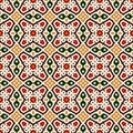 Bright seamless pattern with geometric ornament in Christmas traditional colors. Ethnic and tribal motifs. Royalty Free Stock Photo