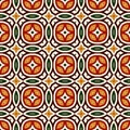 Bright seamless pattern with geometric ornament in Christmas traditional colors. Ethnic and tribal motifs. Royalty Free Stock Photo