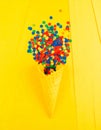 Bright series, confetti and cone yellow background, solid line. Royalty Free Stock Photo