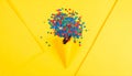 Bright series, confetti and cone yellow background, solid line. Royalty Free Stock Photo
