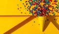 Bright series, confetti and cone yellow background, solid line. Royalty Free Stock Photo