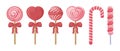 A bright set consisting of red and pink lollipops and candies. Lollipops of various shapes and sizes. Sweets for