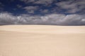 Bright shining white edge of sand dune contrasting against deep blue sky, Corralejo, Fuerteventura, Canary Islands