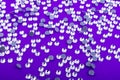 Bright and Shiny Precious Rhinestone Swarovski crystal color on a purple background. Royalty Free Stock Photo