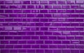 Shiny purple brick tiles on wall. Background texture