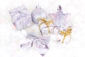 Bright silver Xmas decorations ribbons, presents, baubles, gift boxes on white snow background. Christmas and New Year Royalty Free Stock Photo