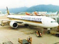 Bright Singapore Airlines aircraft landed at Hong Kong International Airport in May 2012