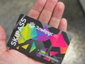 Bright skipass card on human palm. Russia, Elbrus - June 2019