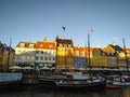 Bright small houses and ships along the Nyhavn Canal. Denmark, Copenhagen.