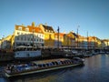 Bright small houses and ships in the Nyhavn harbour. Copenhagen, Denmark. Royalty Free Stock Photo