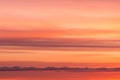 Bright soft sunrise, sunset orange red sky with clouds background texture Royalty Free Stock Photo