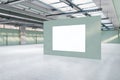 Bright spacious concrete warehouse garage interior with empty white mock up poster. Space and design concept. Royalty Free Stock Photo