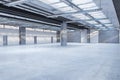 Bright spacious concrete warehouse garage interior. Space and design concept. Royalty Free Stock Photo