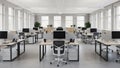 Bright and Spacious Open Plan Office Interior with Rows of Desks and Natural Light workspace Royalty Free Stock Photo