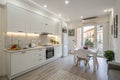 Spacious white kitchen interior after renovation Royalty Free Stock Photo