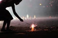 Bright sparkler firework in hand Royalty Free Stock Photo