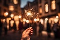 Bright Sparkling Christmas Firework Held in Hand, Festive Celebration Concept with Toning Royalty Free Stock Photo