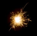 Bright sparks on deep black background closeup