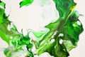 Bright spills of green, light green, yellow colors on a white background. Modern abstract painting