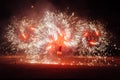 The bright spin fire sparks and fire show in the night Royalty Free Stock Photo
