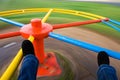 Bright spinning merry-go-round in play park Royalty Free Stock Photo